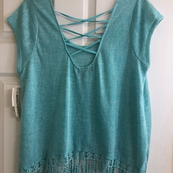 Top with criss cross back and fringe along bottom - Picture 2 of 3